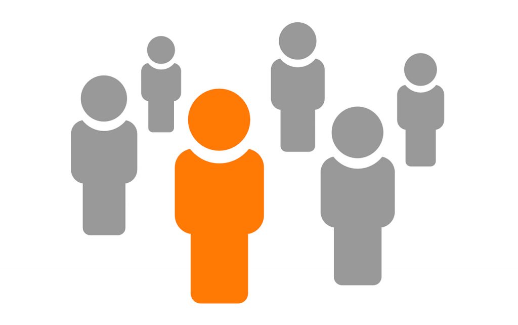 Illustration of five gray people with one orange person in the middle.